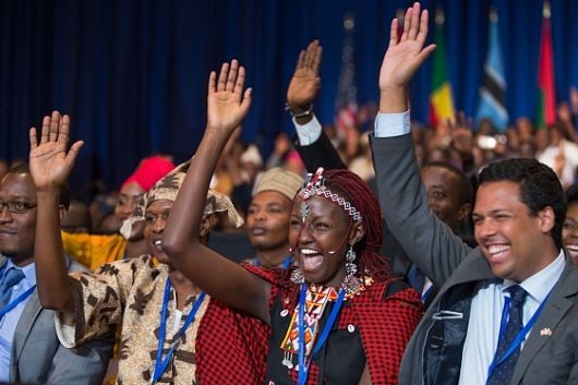 (c) AllAfrica. African youths hailing their leader.